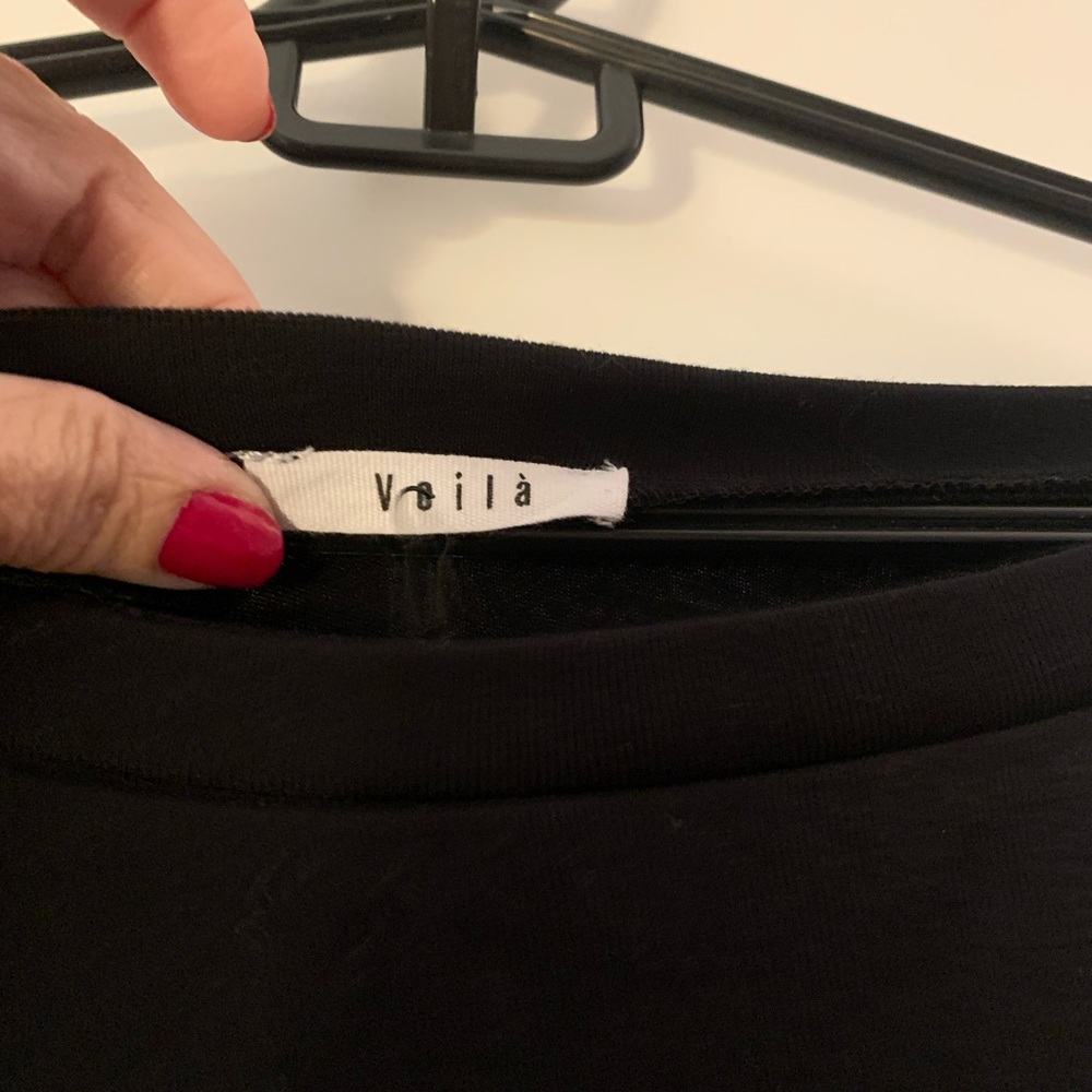 Black top with checkered sleeves